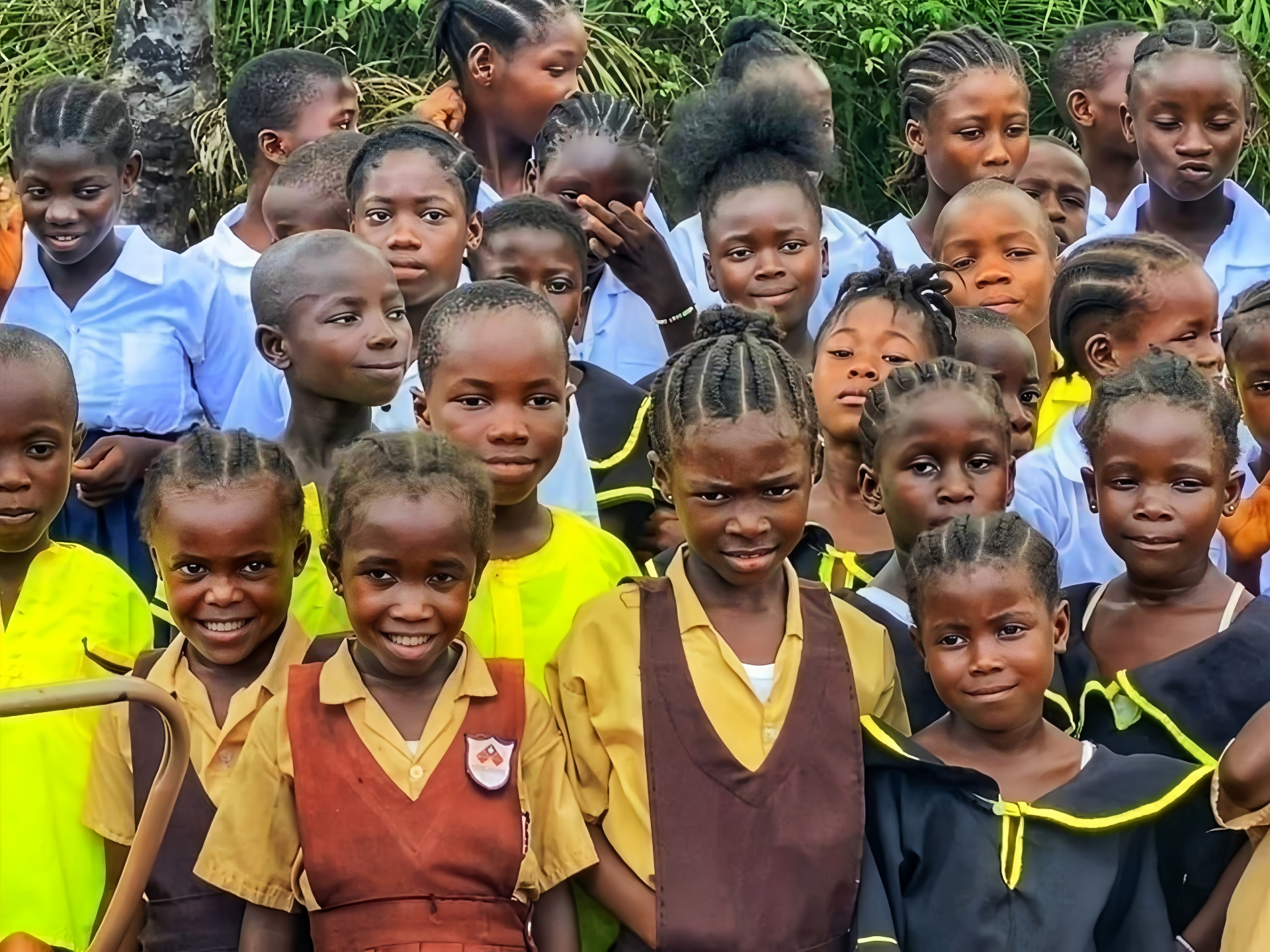 Liberian students in school uniforms provided by Kingdom Relationship Network