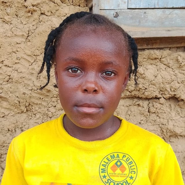 Success V., age 9, in Malema, Liberia