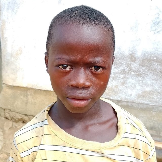 Abraham K., age 10, in Malema, Liberia