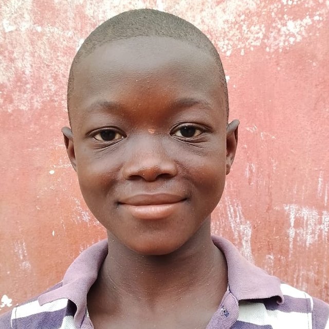 Momo K., age 13, in Malema, Liberia